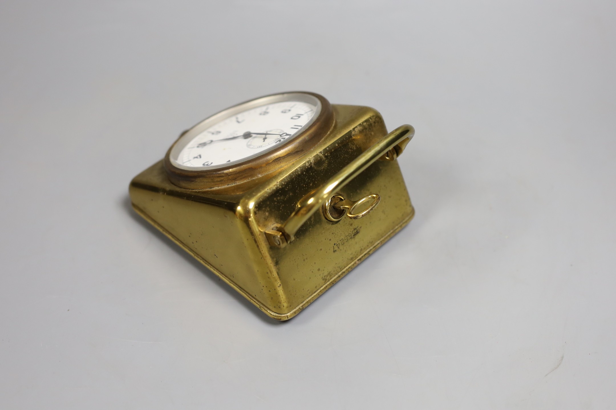 An Omega brass cased nautical deck timepiece with winding key, serial number 9566247